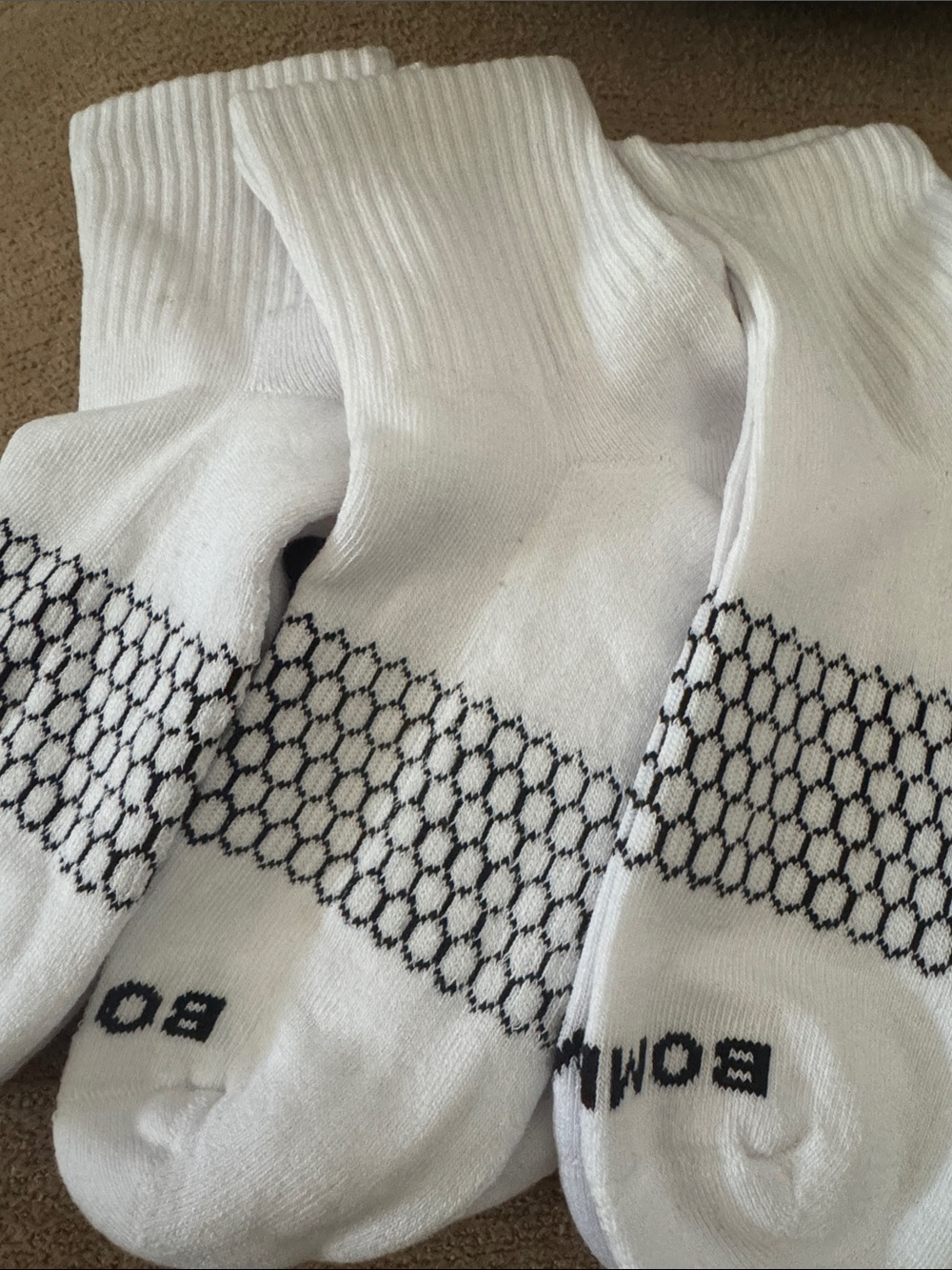 Bombas Unisex White Athletic Crew Socks with Black Honeycomb Pattern